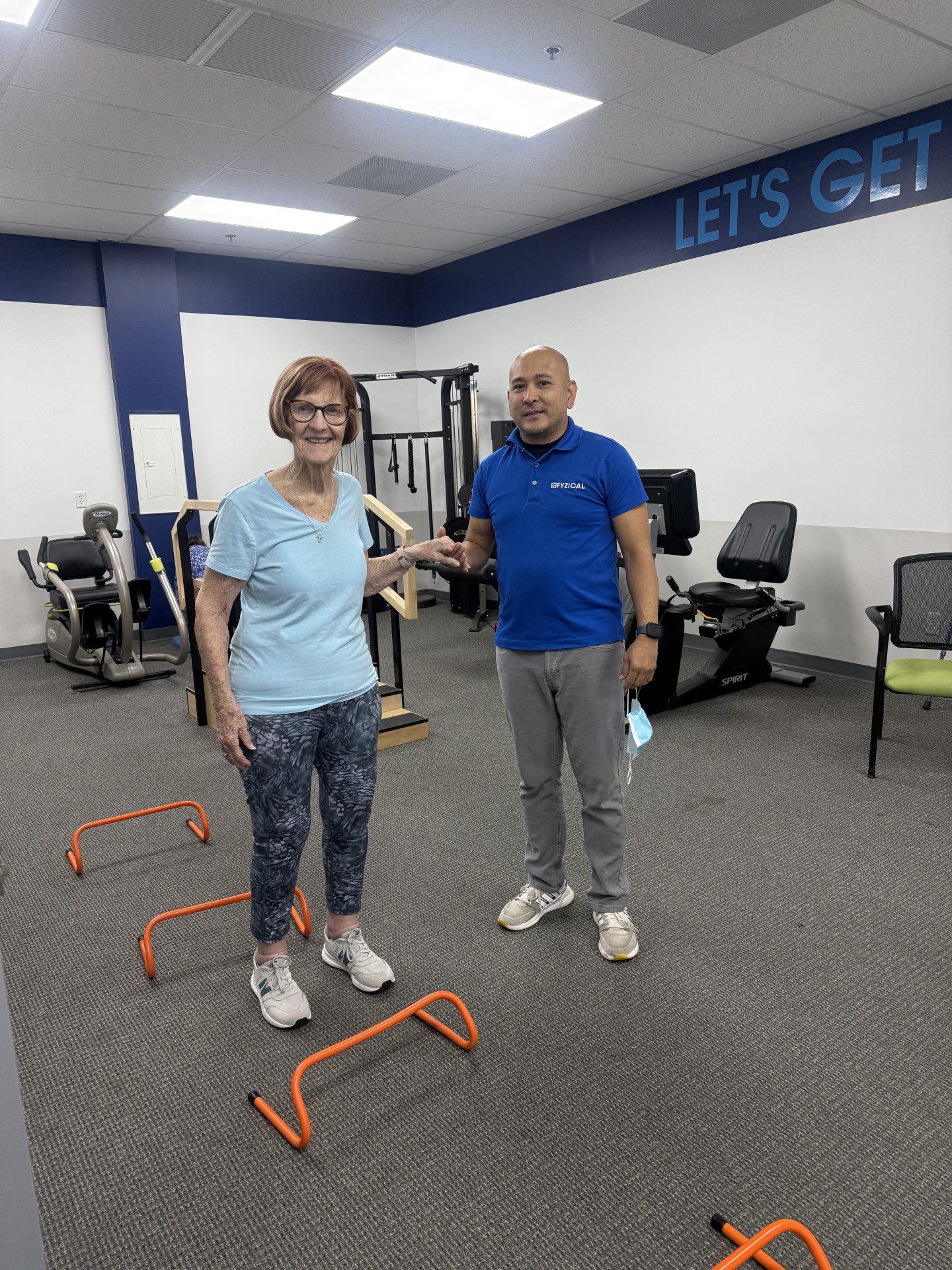 Paul with a patient after a rehab session
