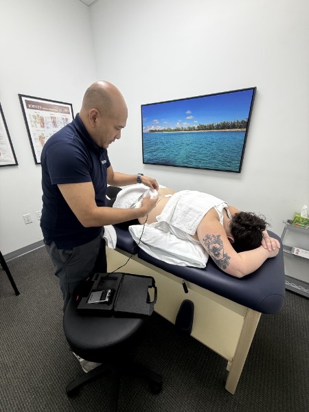 Paul providing manual therapy treatment